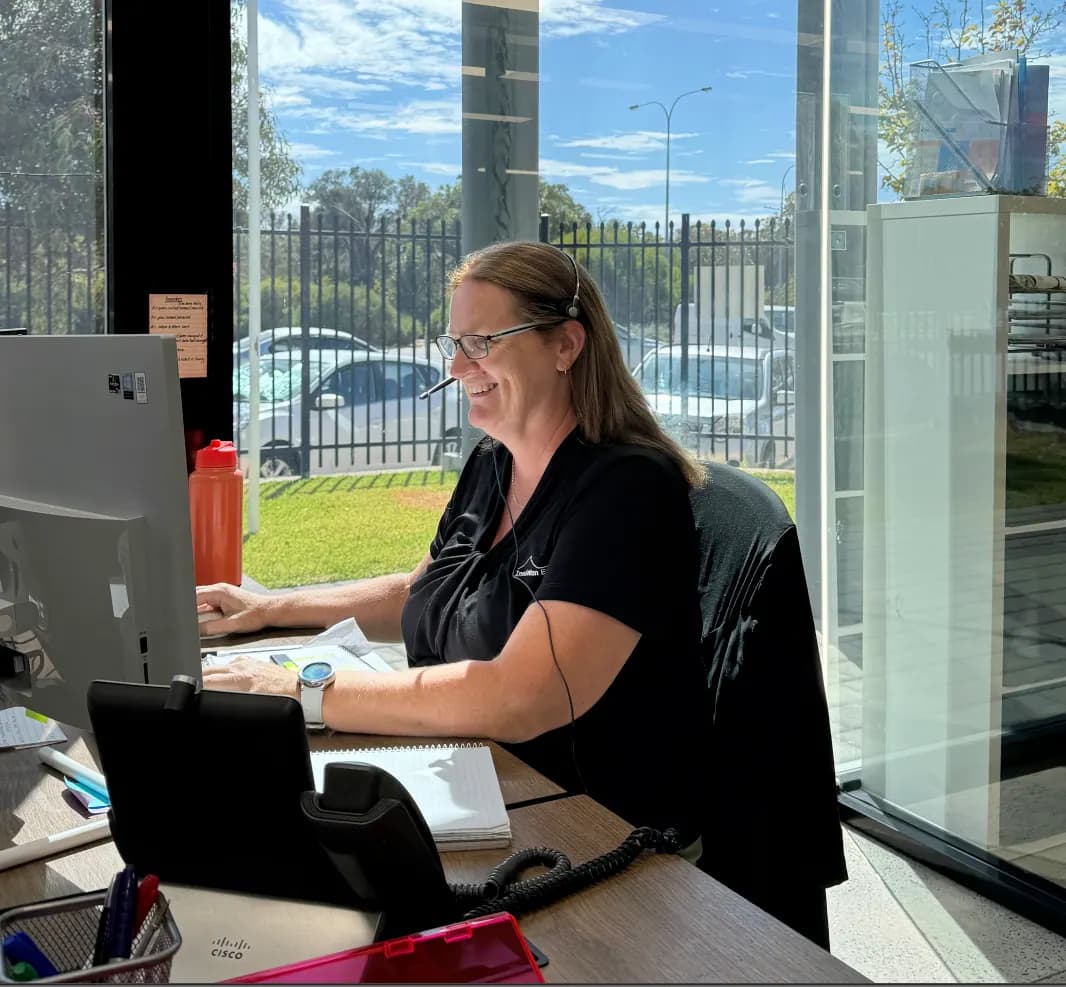 Sydney Insulation staff member taking a customer enquiry call