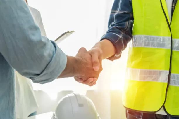 Handshake between a homeowner and an insulation installer